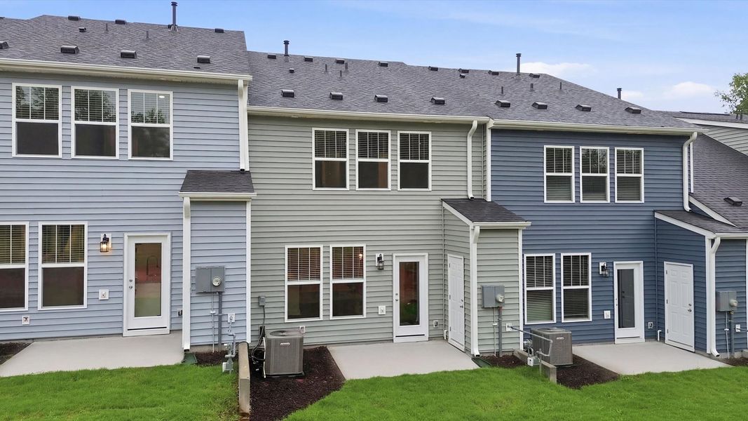 Warm and inviting backyard with a spacious patio and tasteful finishes located in Lyman, SC