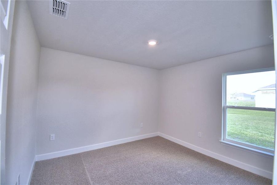 Spacious, unfurnished interior of a new home in Cadence Crossing, Auburndale (Image 37).