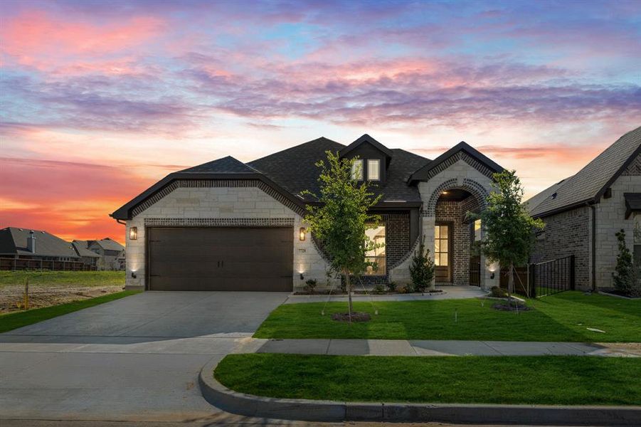 Front exterior of a new home in Silo Mills, Joshua, TX, highlighting curb appeal (Image 17). Front exterior of a new home in Silo Mills, Joshua, TX, highlighting curb appeal (Image 17).