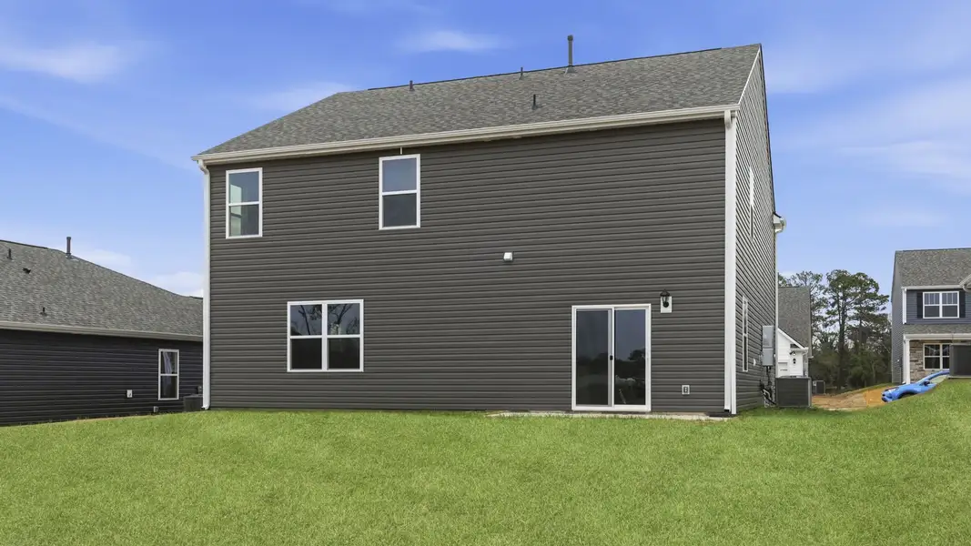 Exterior details and patio area of a home in Waverly Station, Greenwood (Image 3).