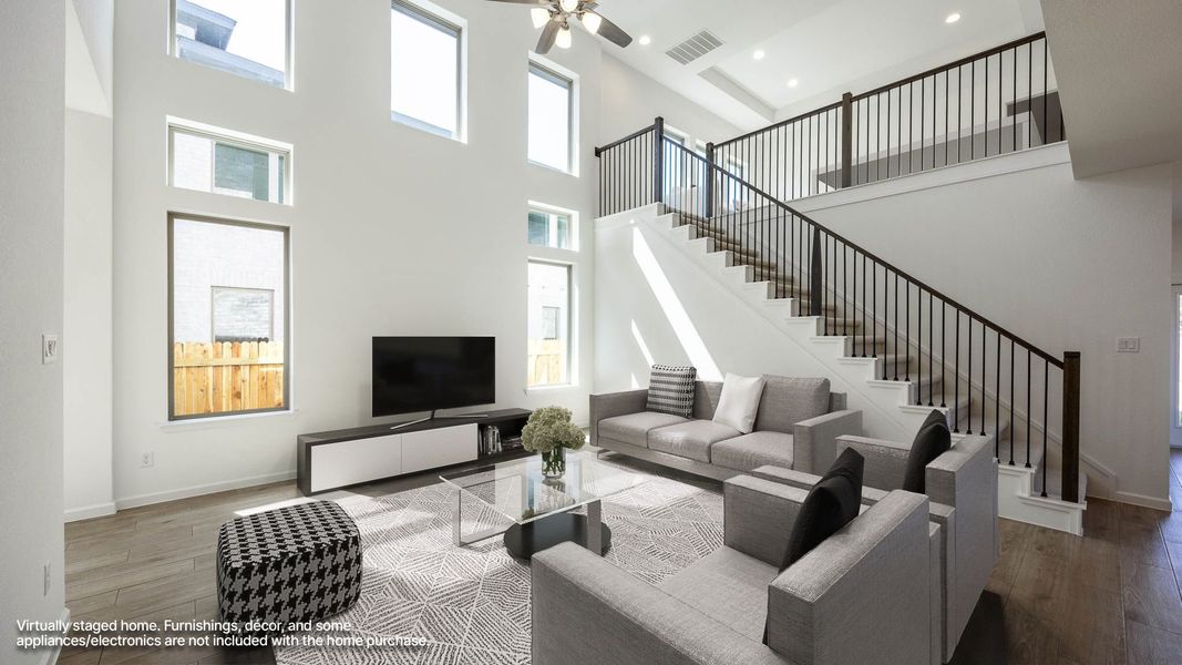Furnished interior view inside a new home in Santa Rita Ranch - Tierra Rosa, Liberty Hill (Image 6). Furnished interior view inside a new home in Santa Rita Ranch - Tierra Rosa, Liberty Hill (Image 6).