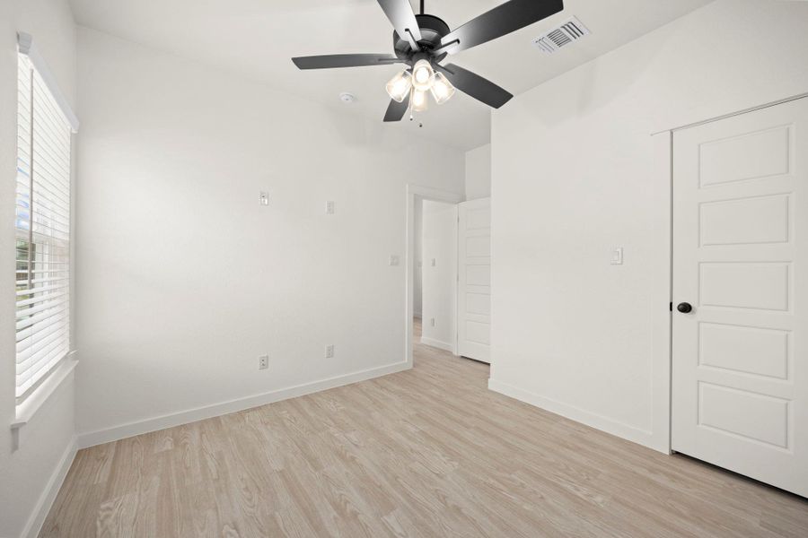 A quiet retreat with fresh finishes, offering bright interiors and contemporary wood-look flooring.