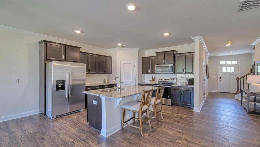 Furnished interior view inside a new home in Townes at Tap Root Farms, Fletcher (Image 8). Furnished interior view inside a new home in Townes at Tap Root Farms, Fletcher (Image 8).