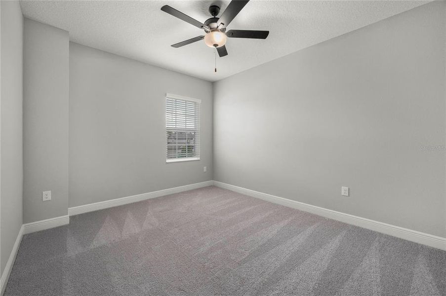 Spacious, unfurnished interior of a new home in Reunion Village, Kissimmee (Image 8).