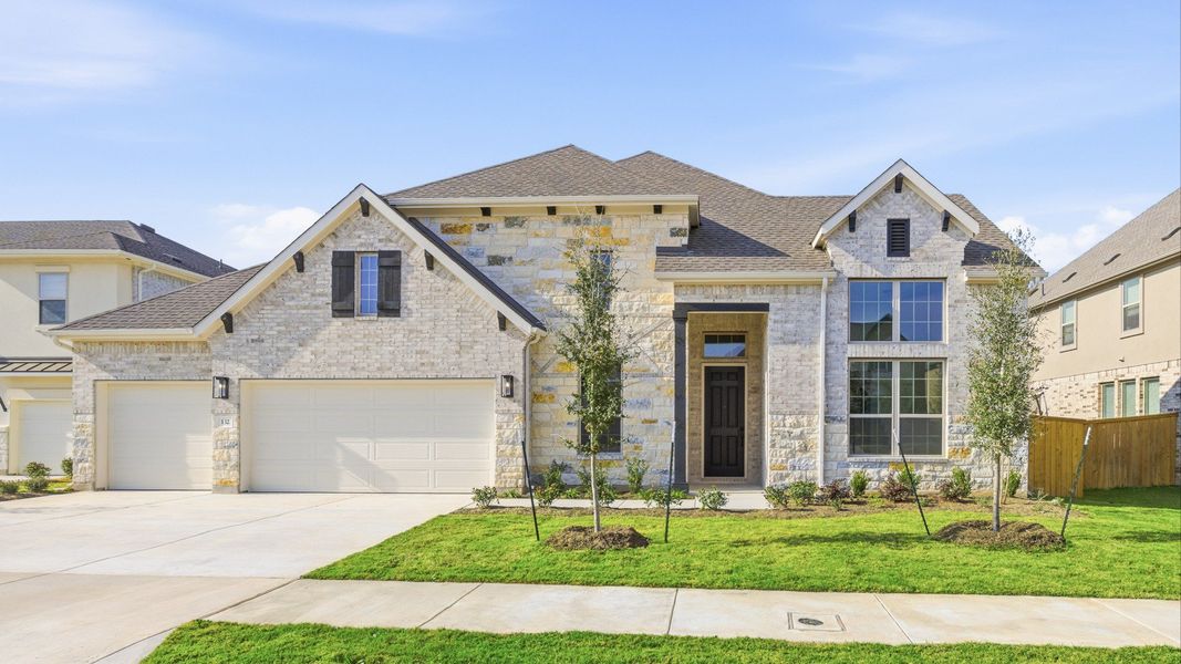 Front exterior of a new home in Oaks at San Gabriel, Georgetown, TX, highlighting curb appeal (Image 19).