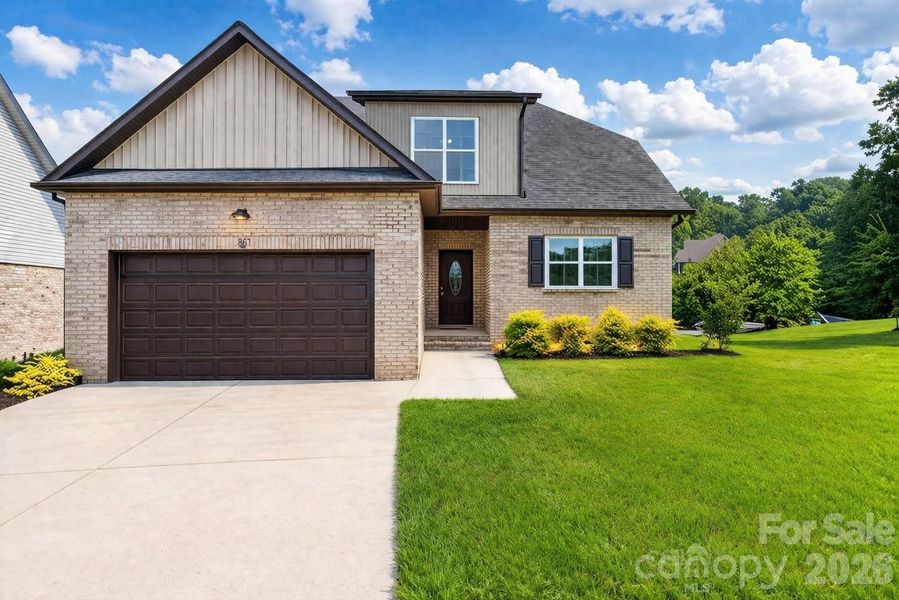 Front exterior of a new home in , Hickory, NC, highlighting curb appeal (Image 1). Front exterior of a new home in , Hickory, NC, highlighting curb appeal (Image 1).