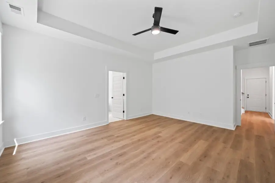 Spacious, unfurnished interior of a new home in Long Bay Golf Club, Longs (Image 27).