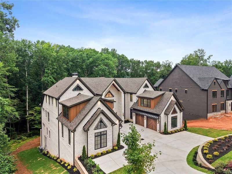 Front exterior of a new home in , Alpharetta, GA, highlighting curb appeal (Image 40). Front exterior of a new home in , Alpharetta, GA, highlighting curb appeal (Image 40).