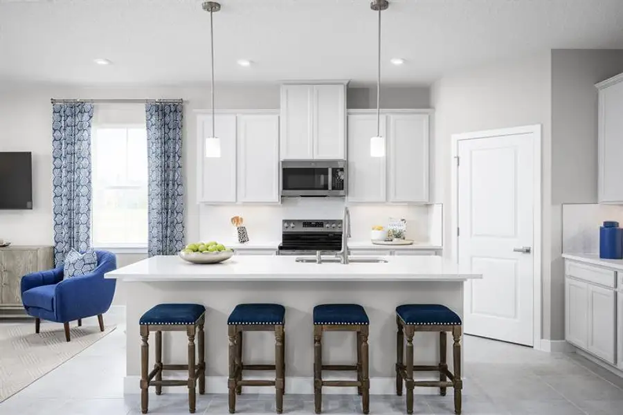 Representative furnished interior of a home built from the Kingsley by Ryan Homes in Bellaviva, Auburndale (Image 2).