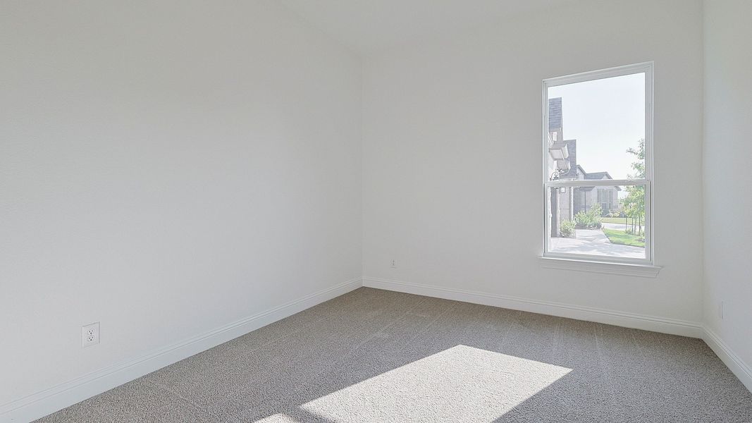 Representative furnished interior of a home built from the Villanova by DRB Homes in Creekhaven, Iowa Colony (Image 16).