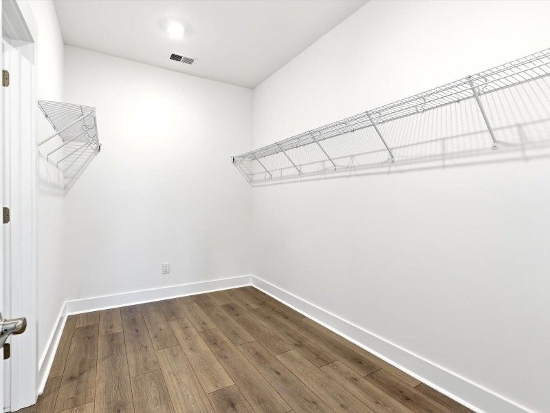 Spacious, unfurnished interior of a new home in The Coves at Lakes of Cane Bay, Summerville (Image 25). Spacious, unfurnished interior of a new home in The Coves at Lakes of Cane Bay, Summerville (Image 25).