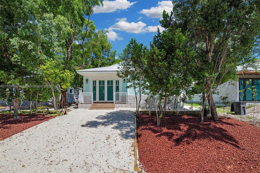 Front exterior of a new home in , Key Largo, FL, highlighting curb appeal (Image 2).