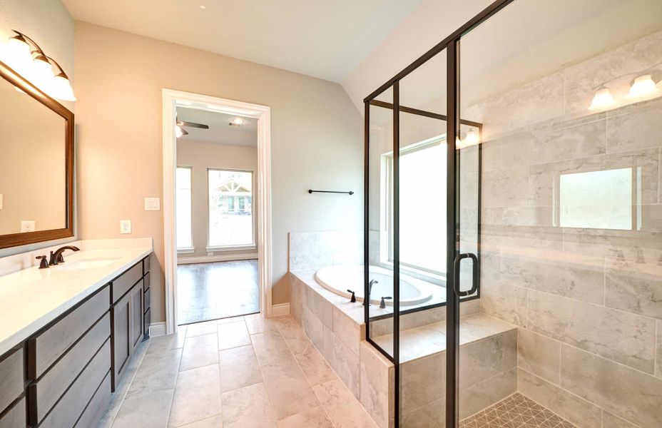 Representative furnished interior of a home built from the 3030 by Ravenna Homes in The Woodlands Hills 65′, Willis (Image 11). Representative furnished interior of a home built from the 3030 by Ravenna Homes in The Woodlands Hills 65′, Willis (Image 11).