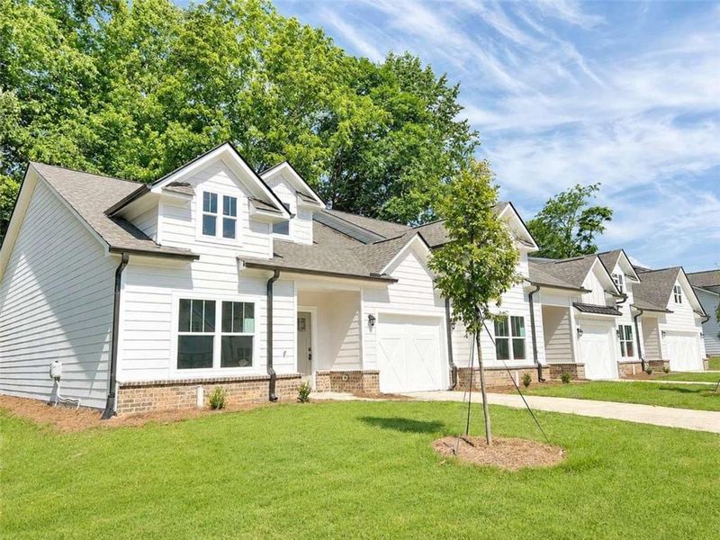 Front exterior of a new home in , Cleveland, GA, highlighting curb appeal (Image 2). Front exterior of a new home in , Cleveland, GA, highlighting curb appeal (Image 2).