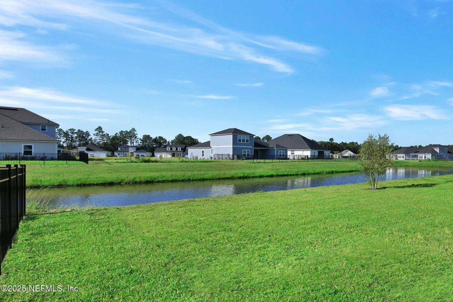 Front exterior of a new home in Hyland Trail, Green Cove Springs, FL, highlighting curb appeal (Image 14). Front exterior of a new home in Hyland Trail, Green Cove Springs, FL, highlighting curb appeal (Image 14).