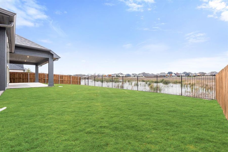 Exterior details and patio area of a home in Sonoma Verde, McLendon-Chisholm (Image 3).