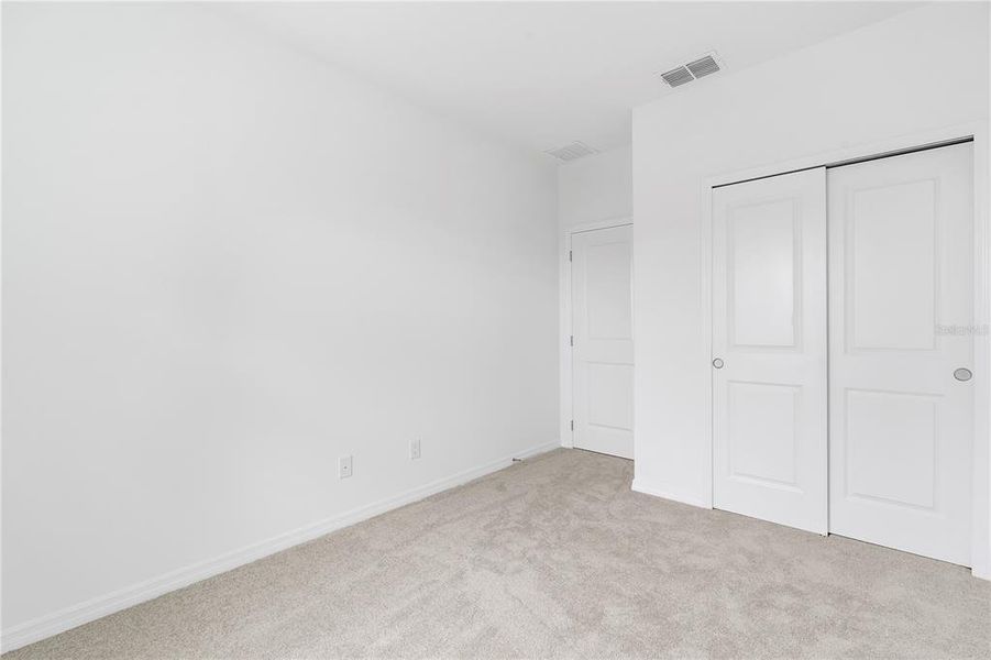 Spacious, unfurnished interior of a new home in Osprey Ranch Townhomes, Winter Garden (Image 29).