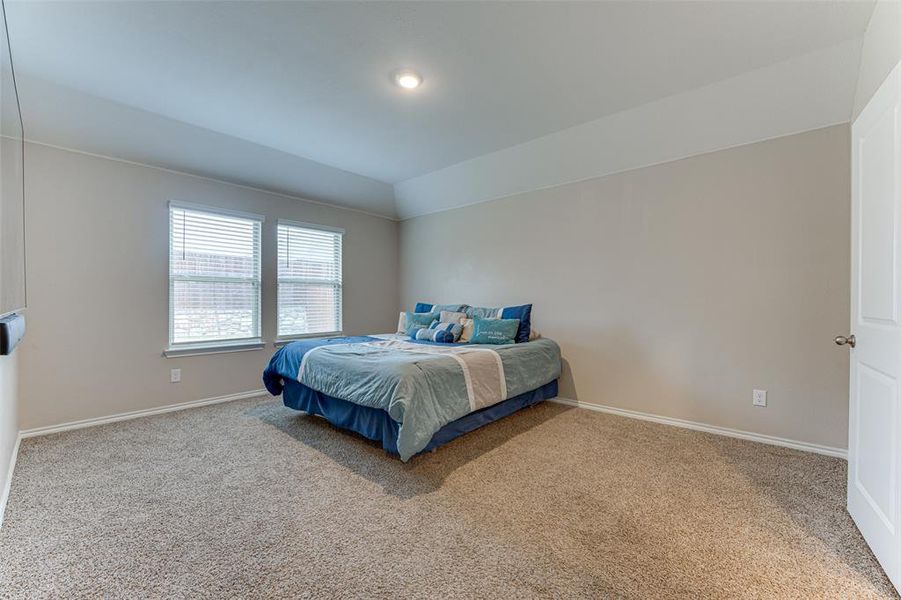 Bedroom featuring carpet