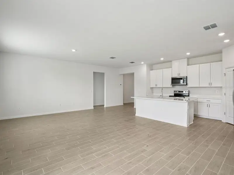 Spacious, unfurnished interior of a new home in Oakfield Trails - Classic Series, Parrish (Image 19).