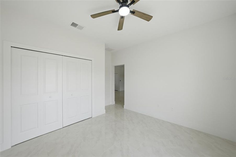 Spacious, unfurnished interior of a new home in , Port Charlotte (Image 34).