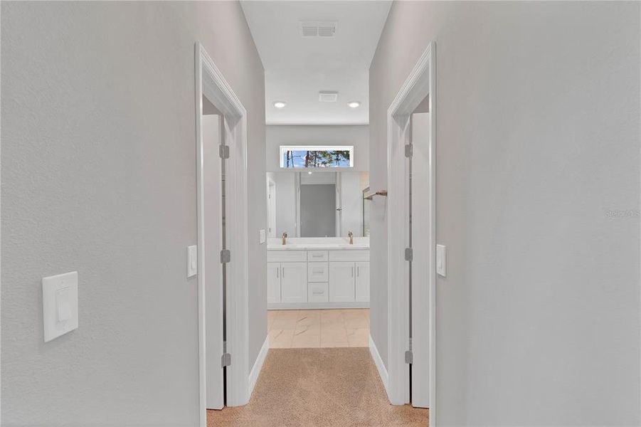 Owner's Suite Walk In His/Her Closets