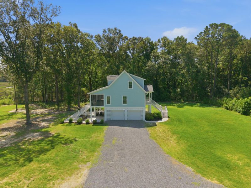 Front exterior of a new home in , Johns Island, SC, highlighting curb appeal (Image 1). Front exterior of a new home in , Johns Island, SC, highlighting curb appeal (Image 1).