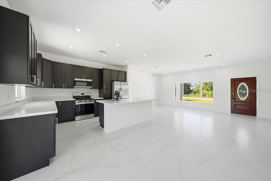 Furnished interior view inside a new home in , Avon Park (Image 4).
