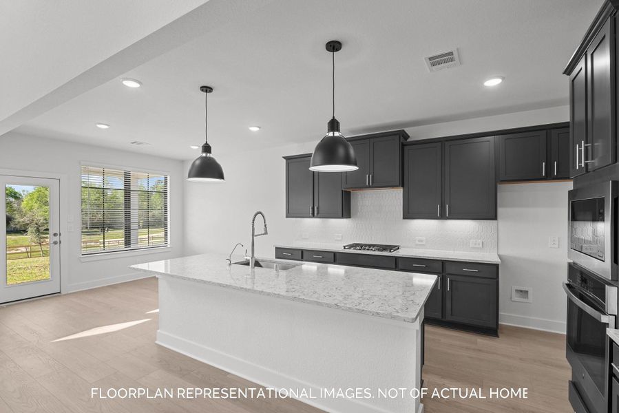 Furnished interior view inside a new home in Lone Star Landing, Montgomery (Image 6).