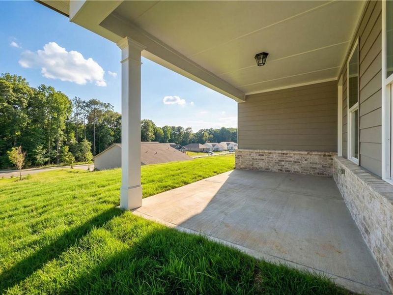 Exterior details and patio area of a home in Kelly Preserve, Loganville (Image 4).