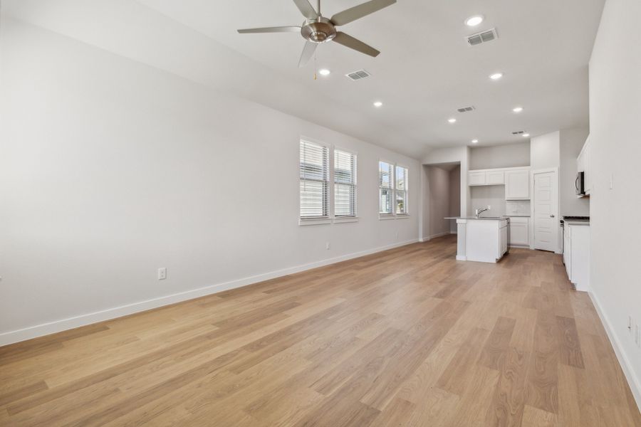 Living Room in the Cedar home plan by Trophy Signature Homes – REPRESENTATIVE PHOTO