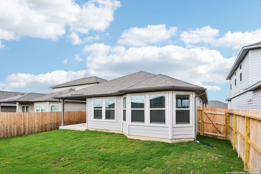 Front exterior of a new home in Legendary Trails - Premier Series, Cibolo, TX, highlighting curb appeal (Image 22). Front exterior of a new home in Legendary Trails - Premier Series, Cibolo, TX, highlighting curb appeal (Image 22).