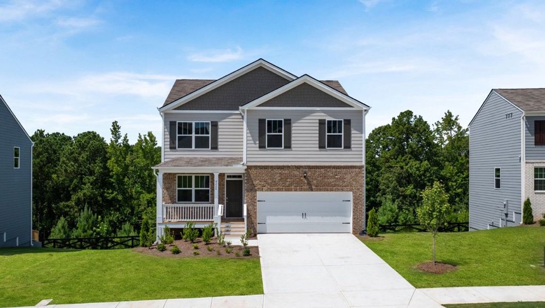 Representative exterior photo of a completed home built from the BELHAVEN by D.R. Horton in Oaks at Cedar Grove, Fairburn, GA (Image 1).