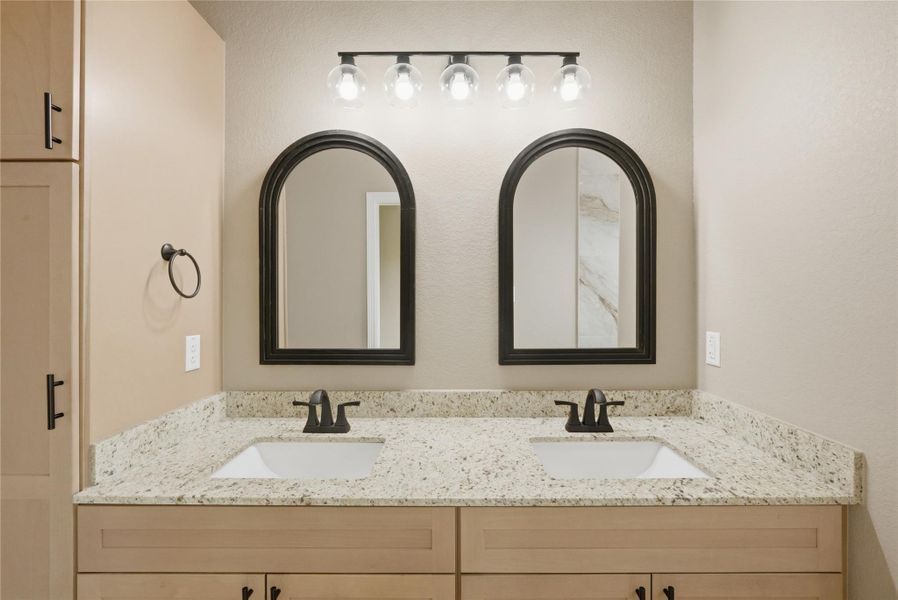 Full bathroom with double vanity