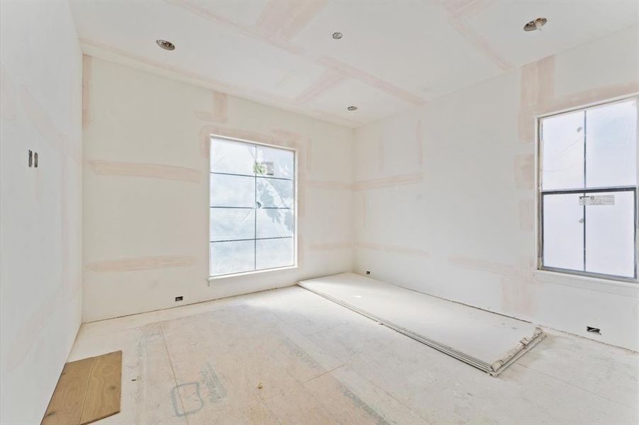 Upstairs bedroom with  plenty of natural light.