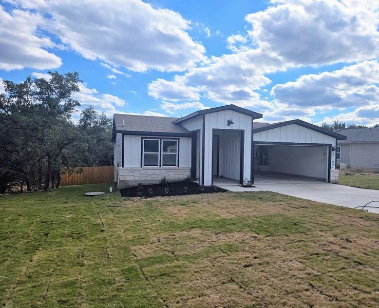 Front view is now fully landscaped Front view is now fully landscaped