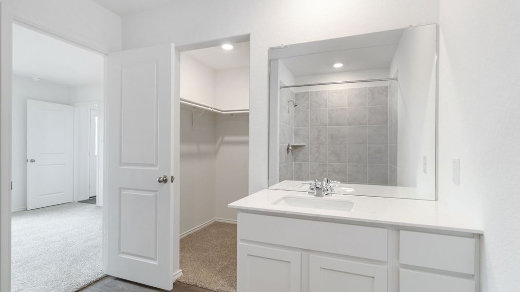 Representative furnished interior of a home built from the T30B Barton by D.R. Horton in Riverfield, Josephine (Image 9).