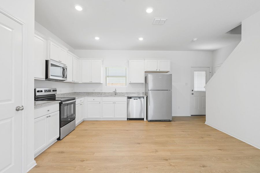 Furnished interior view inside a new home in Canyon Ranch, Jarrell (Image 4).