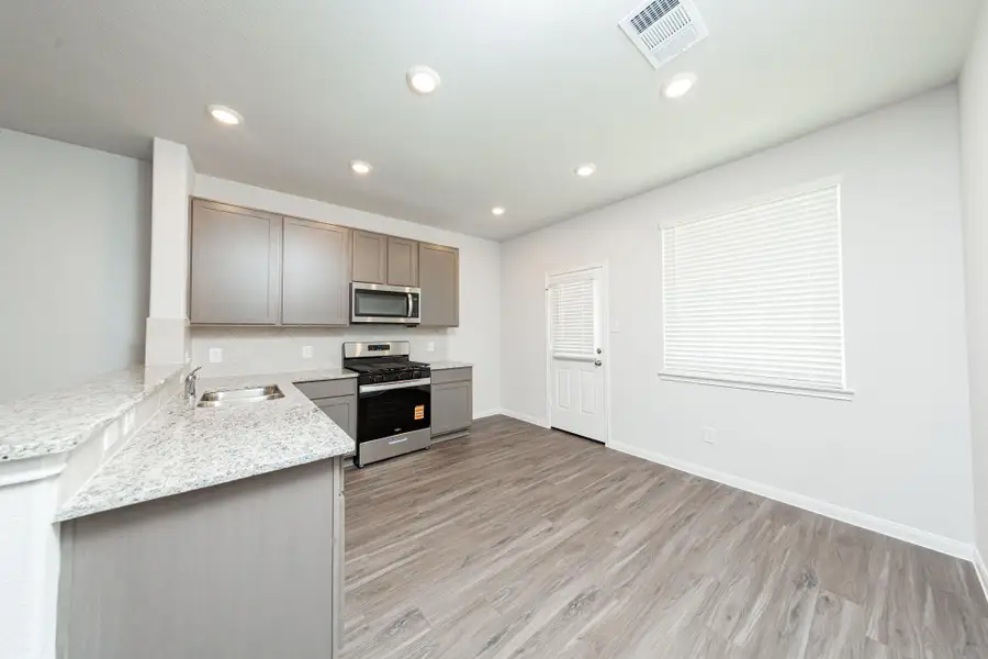 Furnished interior view inside a new home in River's Edge, Conroe (Image 4).