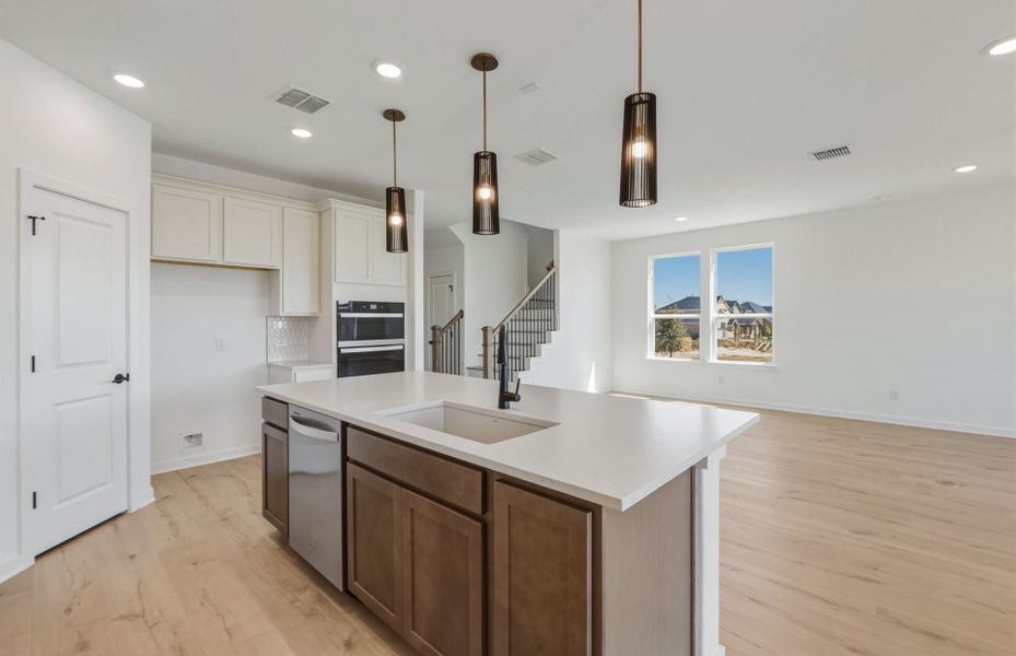 Representative furnished interior of a home built from the Lochridge by Pulte Homes in Woodside, Georgetown (Image 5).