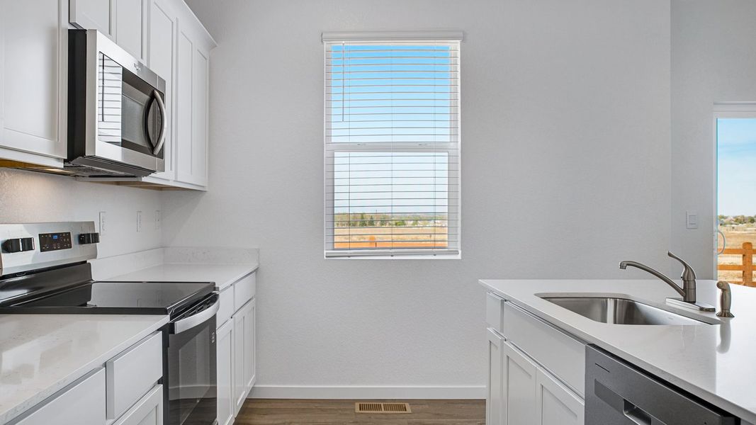 Furnished interior view inside a new home in Vista Meadows, Fort Lupton (Image 13).