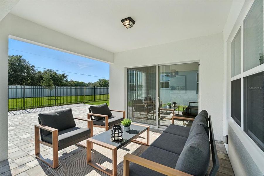 Exterior details and patio area of a home in Amelia Groves, St. Cloud (Image 3).