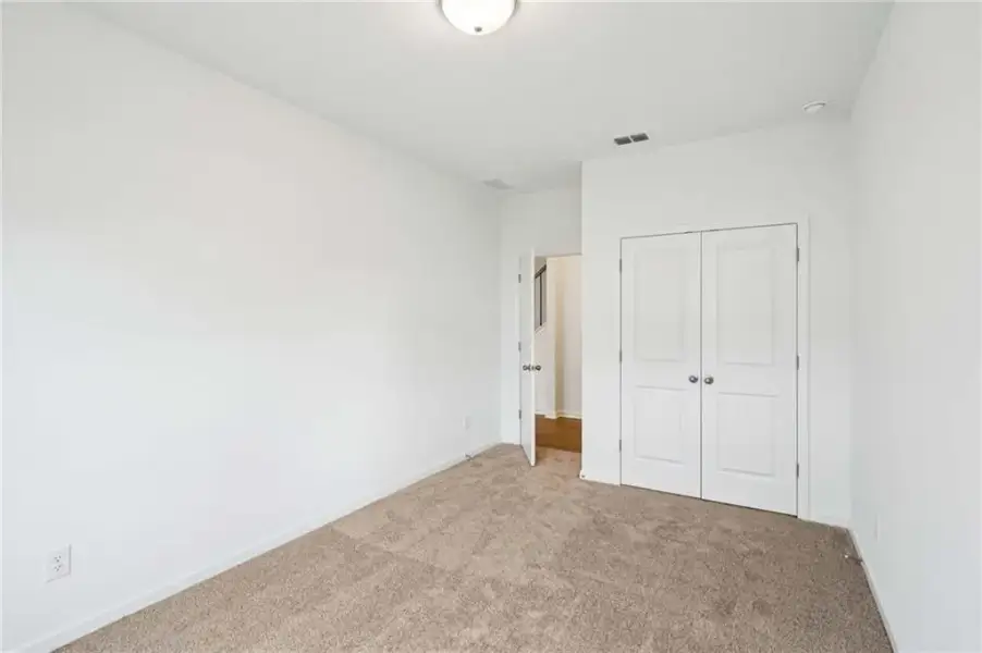 Spacious, unfurnished interior of a new home in Eastlyn Crossing, Flowery Branch (Image 21). Spacious, unfurnished interior of a new home in Eastlyn Crossing, Flowery Branch (Image 21).