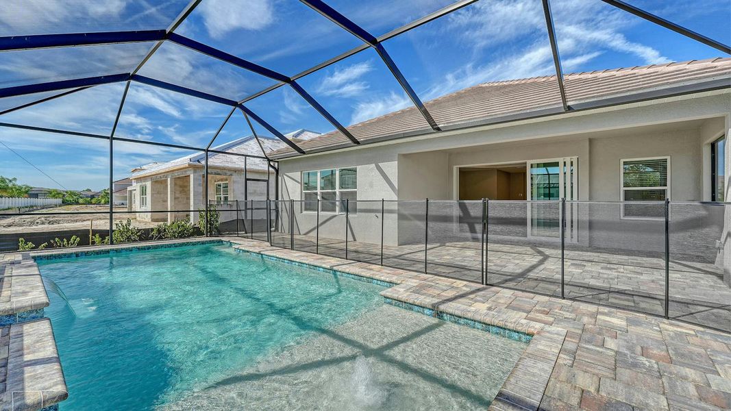 Exterior details and patio area of a home in Windward Real Estate and Homes for Sale in Sarasota, FL - Neal Communities, Lakewood Ranch (Image 29).