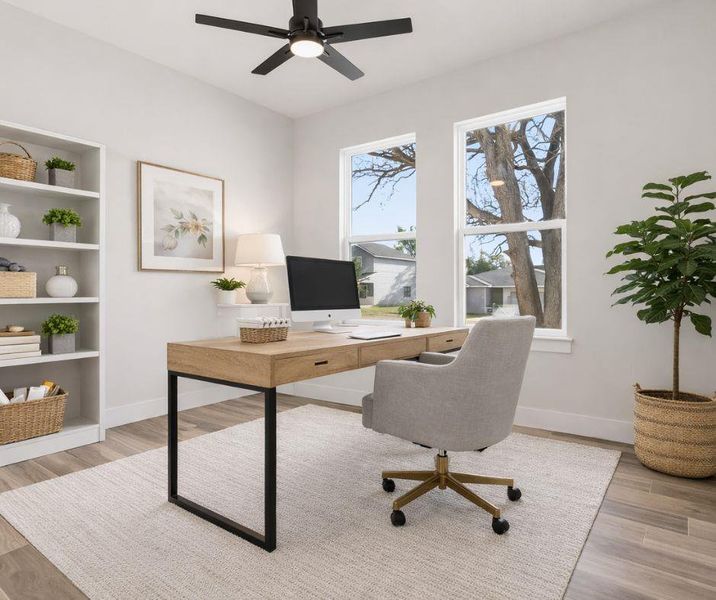 Dedicated office with cathedral ceilings on main level with virtual staging