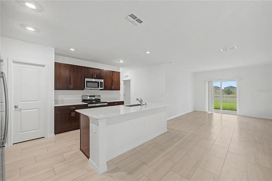 Furnished interior view inside a new home in Park East, Plant City (Image 6).