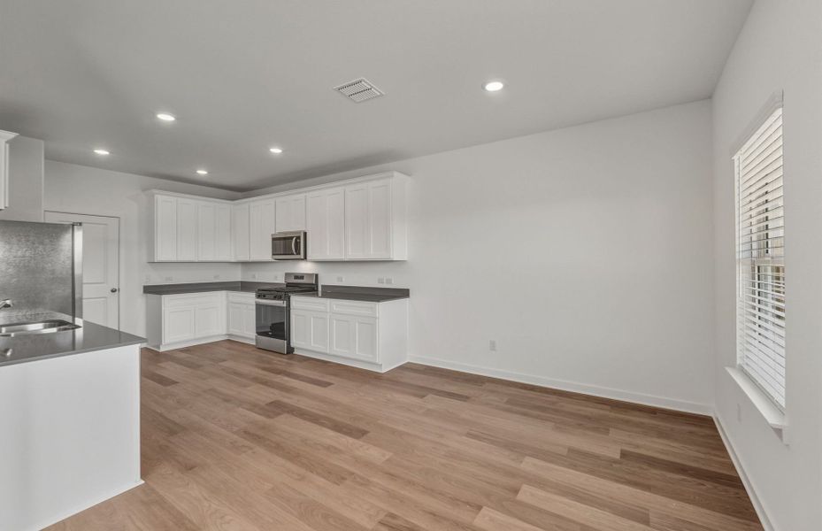 Furnished interior view inside a new home in Sunfield, Buda (Image 9).
