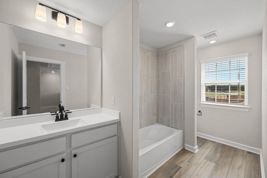 Furnished interior view inside a new home in Sunterra, Katy (Image 8).