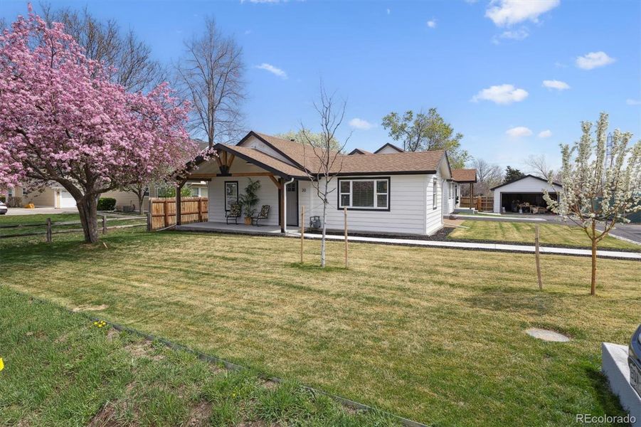 Front exterior of a new home in , Lakewood, CO, highlighting curb appeal (Image 18).