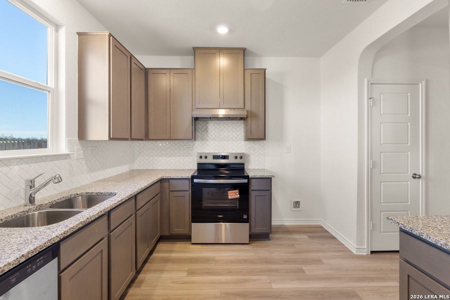 Furnished interior view inside a new home in , San Antonio (Image 9).