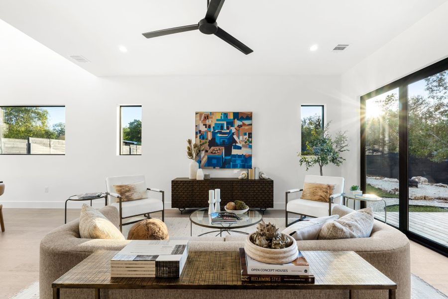 Spacious living room with sliders to the deck